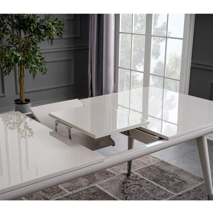 NIL GLOSSY CREAM EXTENDABLE DINING  TABLE IN STEEL LEGS